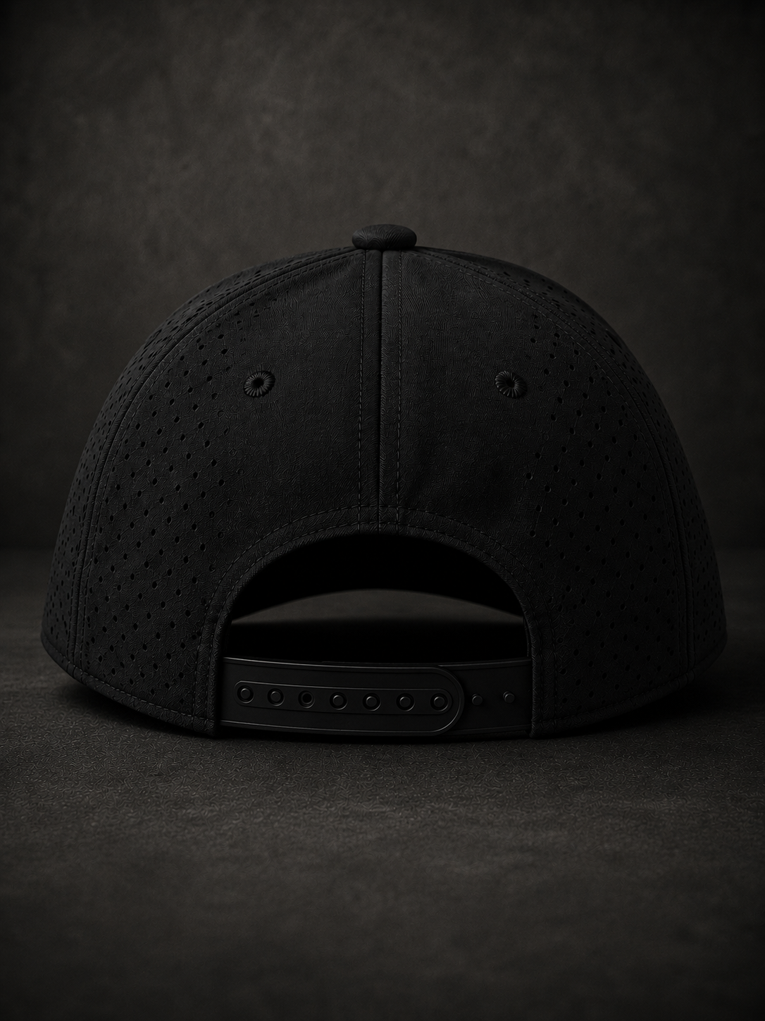 Black rope hat, back view with perforated crown and adjustable strap