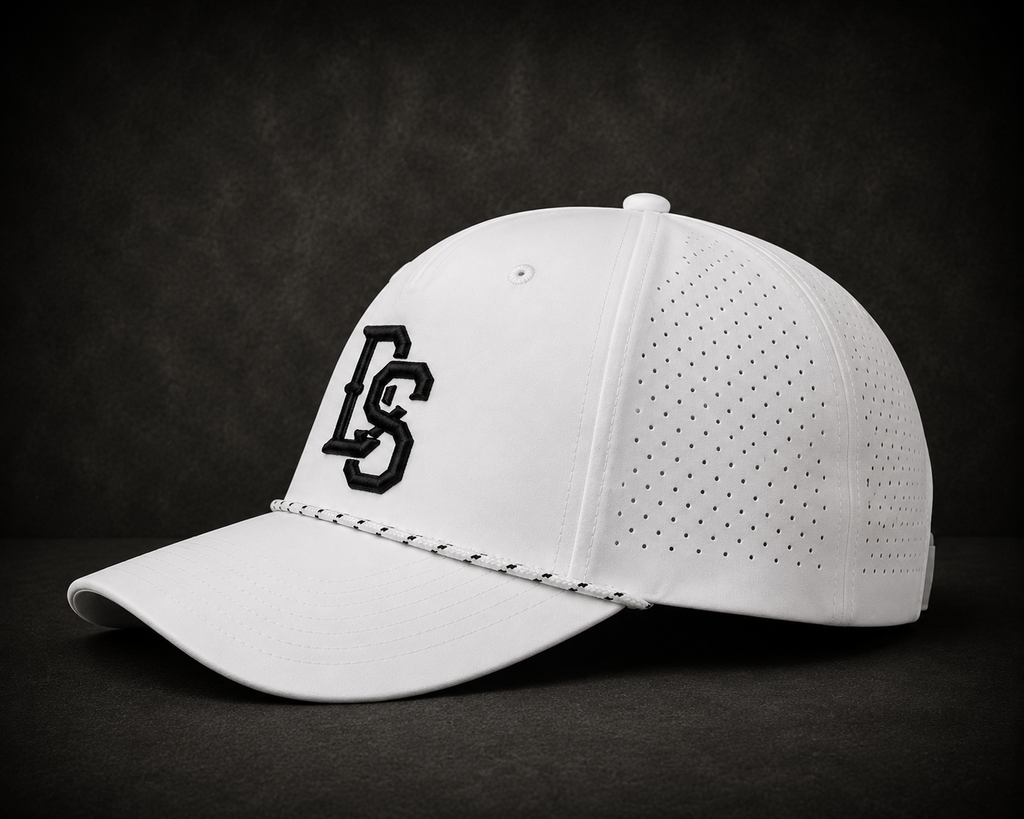White baseball cap with black DS logo on side, perforated panels, curved brim, snapback strap.