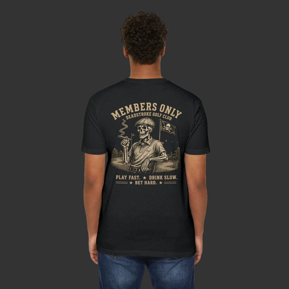 Black golf T-shirt worn by model, back Members Only skull graphic