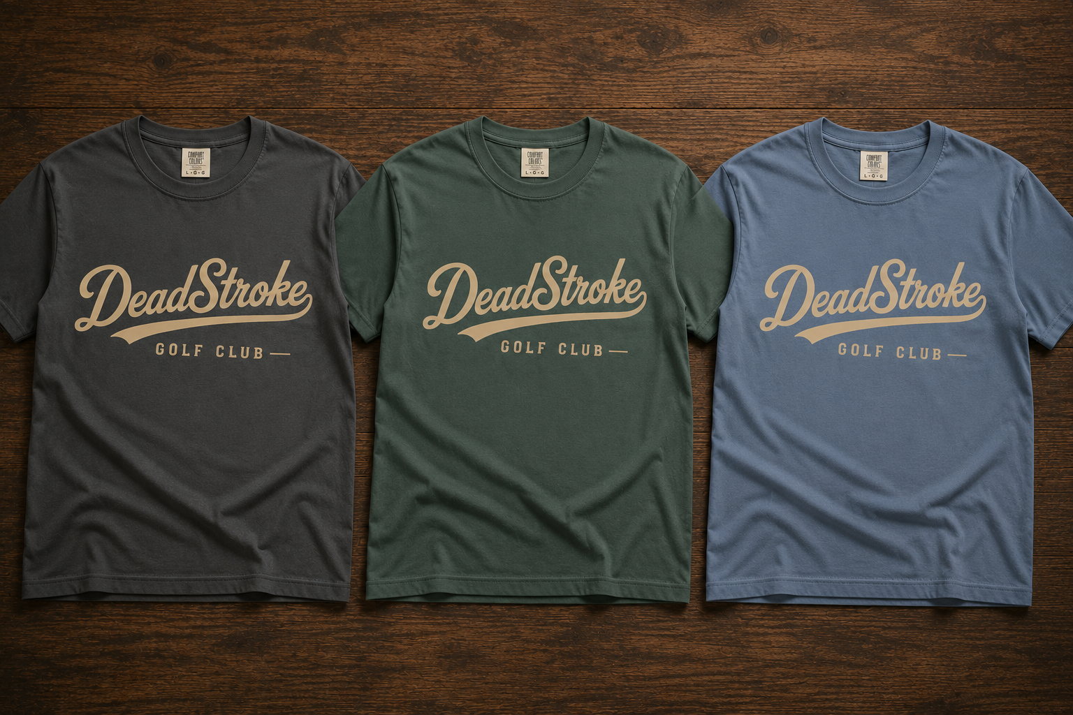 Three crewneck graphic T-shirts in dark, green, and blue, each with DeadStroke Golf Club logo.