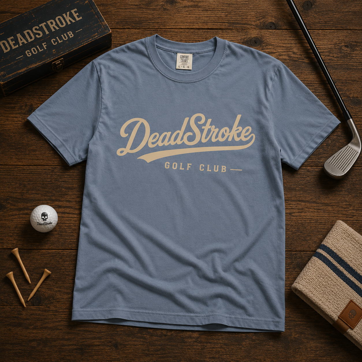 Sky blue crewneck graphic T-shirt with DeadStroke Golf Club script logo on front.